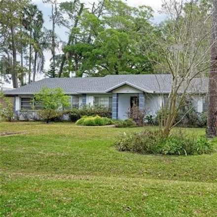 Buy this 4 bed house on 115 West Crystal Drive in Greenbriar, Seminole County