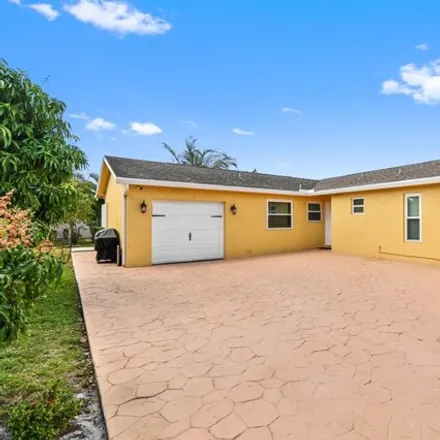 Rent this 3 bed house on 4358 Lisa Drive in Lucerne Lakes, Palm Beach County