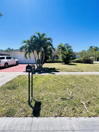 Rent this 3 bed house on 104 Cocoplum Circle in Royal Palm Beach, Palm Beach County