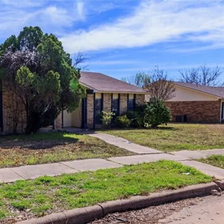 Rent this 4 bed house on 3110 Somerville Ln in Carrollton, Texas