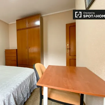 Rent this 4 bed room on Plaça del Cedre in 46021 Valencia, Spain