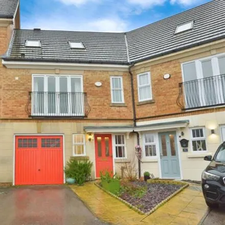 Buy this 4 bed townhouse on Caroline Haslett Primary School in Faraday Drive, Bletchley