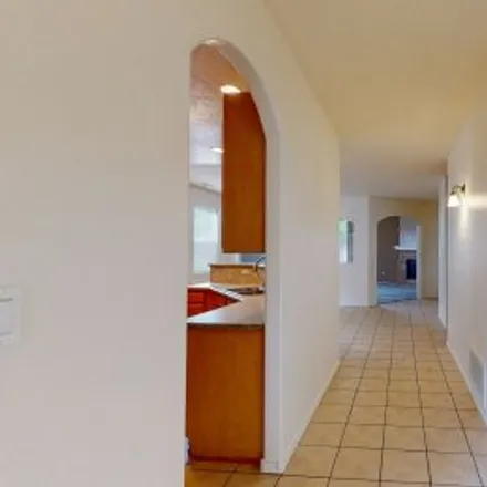 Buy this 4 bed apartment on 7139 Crosswinds Trl Northwest in Paradise Hills Civic, Albuquerque