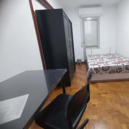 Rent this 4 bed room on Rua João de Castro Osório 7 in 1800-281 Lisbon, Portugal