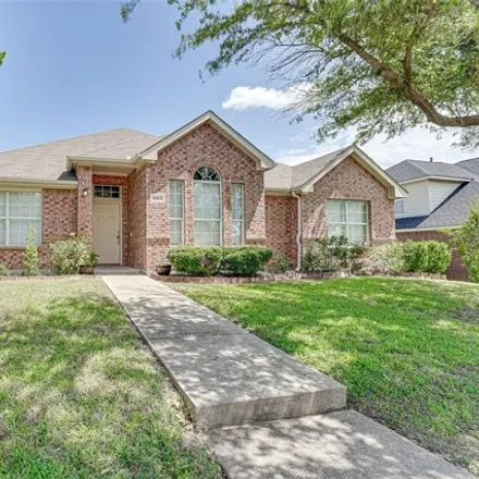Buy this 4 bed house on 5413 Onset Bay Dr in Rowlett, Texas