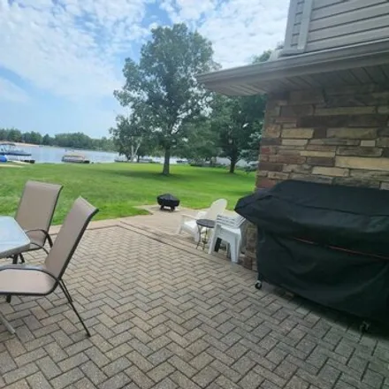 Image 7 - 7218 Holiday Drive, Canadian Lakes, Morton Township, MI 49346, USA - House for sale