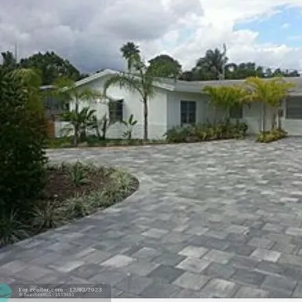 Rent this 4 bed house on 1571 Northeast 38th Street in Coral Heights, Oakland Park