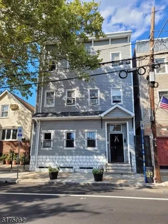 Buy this 6 bed townhouse on 132 Walnut Street in Newark, NJ 07105