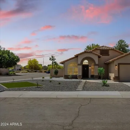 Buy this 4 bed house on 7709 West Boca Raton Road in Peoria, AZ 85381