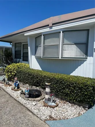 Image 2 - 166 Thatch Palm Street East, Baskin, Largo, FL 33770, USA - House for rent