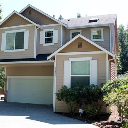 Rent this 4 bed house on 11877 Southeast 176th Court in Benson Hill, Renton
