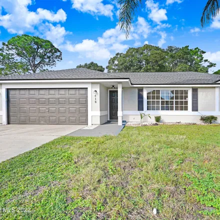 Buy this 3 bed house on 418 Empire Avenue Northeast in Palm Bay, FL 32907