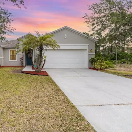 Buy this 3 bed house on 1567 Jupiter Boulevard Northwest in Palm Bay, FL 32907