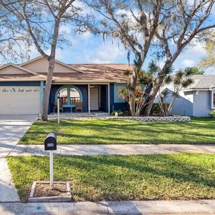 Buy this 3 bed house on Sandbar Architecture in 1162 Rolling Oaks Avenue, Tarpon Springs