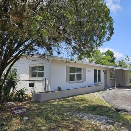 Buy this 3 bed house on 1076 Bougainvillea Road East in Lehigh Acres, FL 33936