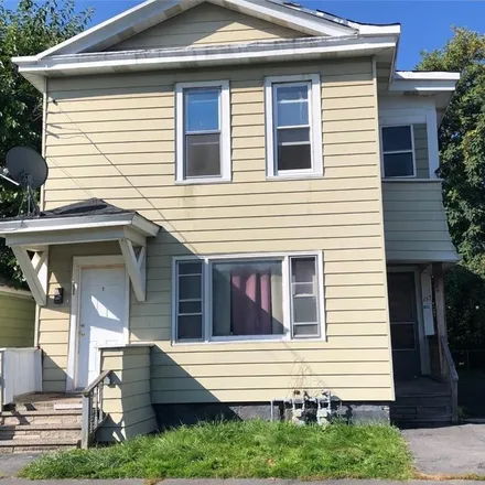 Buy this 6 bed townhouse on 211 Sackett Street in City of Syracuse, NY 13204