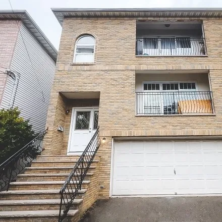 Rent this 3 bed townhouse on 77 Thomas Street in Newark, NJ 07114