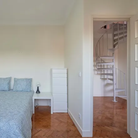 Rent this 14 bed room on Rua Carlos Malheiro Dias 11 in 1700-108 Lisbon, Portugal