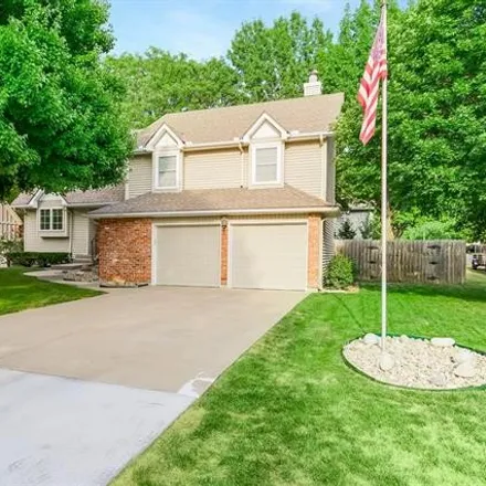 Buy this 4 bed house on 14025 South Summertree Lane in Olathe, KS 66062