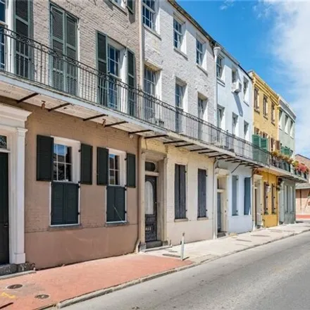 Buy this 3 bed townhouse on 833 Burgundy Street in New Orleans, LA 70116