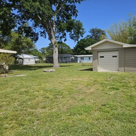 Image 5 - 182 Northwest Pine Street, West Melbourne, FL 32904, USA - House for sale