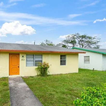 Rent this 3 bed house on 4847 Gulfstream Road in Palm Beach County, FL 33461