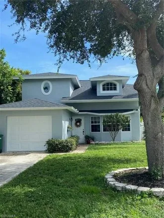 Buy this 4 bed house on 718 92nd Avenue North in Collier County, FL 34108