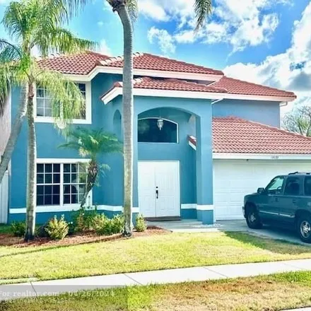 Rent this 4 bed house on 10131 Brookville Lane in Palm Beach County, FL 33428