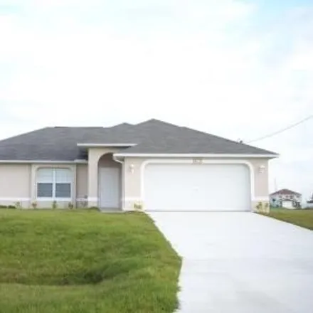 Rent this 4 bed house on Northeast 6th Street in Cape Coral, FL 33909