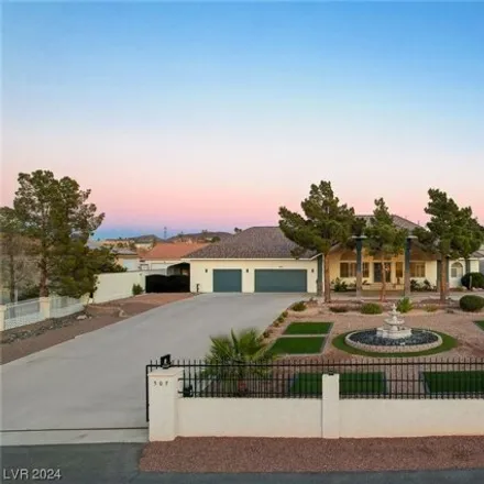 Buy this 4 bed house on 1004 Geneva Avenue in Henderson, NV 89015