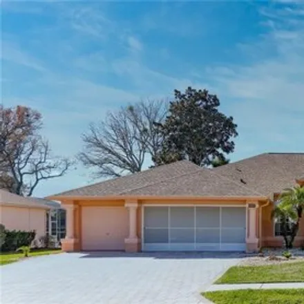 Buy this 3 bed house on 3387 Conifer Loop in Spring Hill, FL 34609