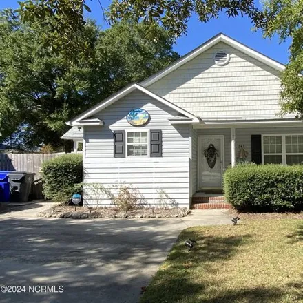 Rent this 2 bed house on 147 NE 21st St in Oak Island, North Carolina