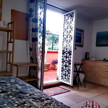 Rent this 3 bed room on Via Alberto Caroncini in 00197 Rome RM, Italy