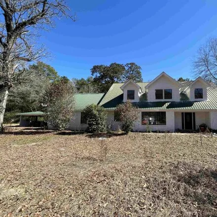 Buy this 4 bed house on 592 County Road 740 in Buna, Jasper County