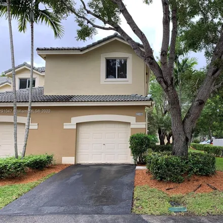 Rent this 4 bed townhouse on 2165 Pasa Verde Lane in Weston, FL 33327