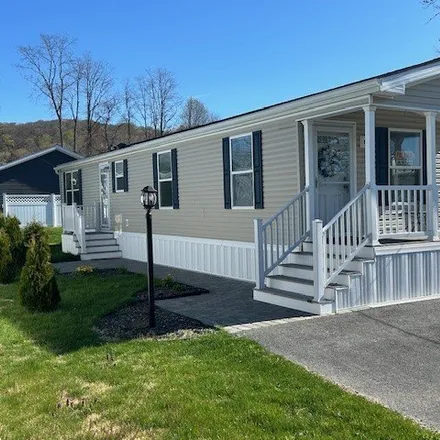 Buy this studio apartment on 61 Greenlawn Dr in Danbury, Connecticut