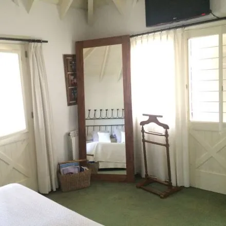 Buy this 4 bed house on Juan Recarte 653 in Partido de Esteban Echeverría, 1842 Monte Grande