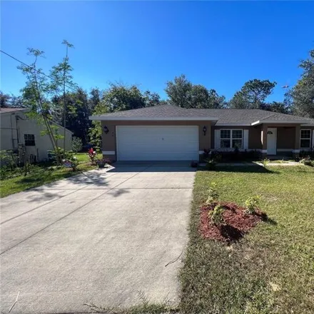 Buy this 3 bed house on 44 Dogwood Loop in Marion County, FL 34472