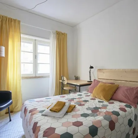 Rent this 4 bed room on Rua dos Heróis de Quionga 1 in 1170-179 Lisbon, Portugal