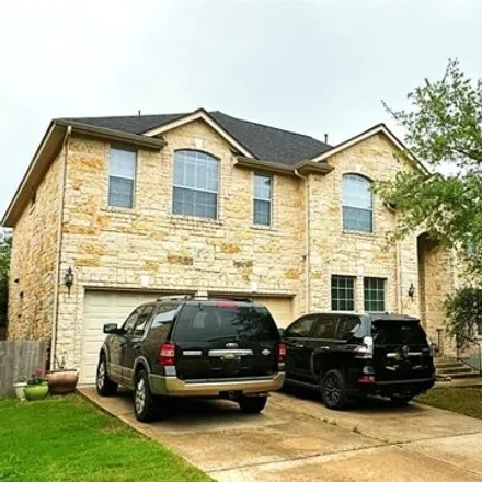 Rent this 4 bed house on 5829 Sunset Ridge in Austin, TX 78735