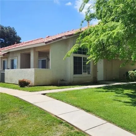 Rent this 3 bed townhouse on 1642 Gardenia Court in Lancaster, CA 93535