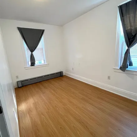 Rent this 2 bed apartment on 48-34 206th Street in New York, NY 11364