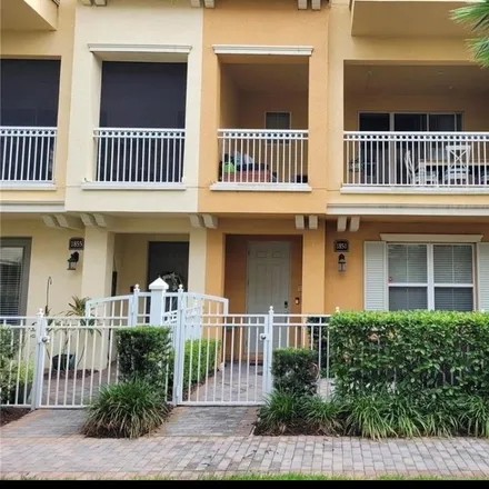 Rent this 4 bed townhouse on 1998 Piedmont Place in Paola, Seminole County