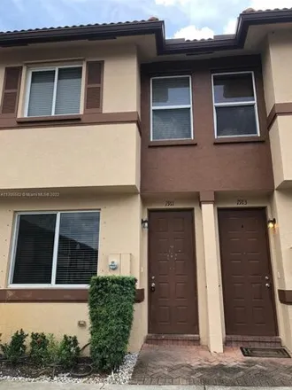 Buy this 3 bed townhouse on 3298 Mirella Drive in Riviera Beach, FL 33404