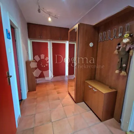 Rent this 4 bed apartment on 58054 in 51221 Kostrena, Croatia