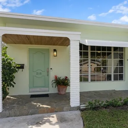 Rent this 4 bed house on 243 Columbia Drive in Lake Worth Beach, FL 33460