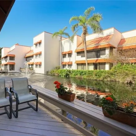 Buy this 2 bed condo on Serendipity Court in Pelican Bay, FL 34108