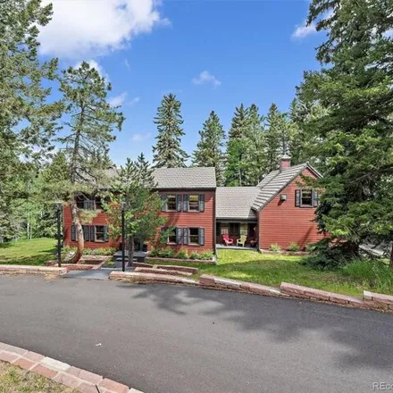 Buy this 5 bed house on 26995 Wapiti Dr in Evergreen, Colorado
