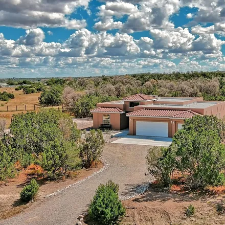 Buy this 4 bed house on 24 Cam Coyote in Edgewood, NM 87015
