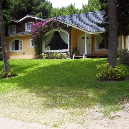 Rent this 3 bed house on Troya in Partido de Pinamar, 7167 Pinamar